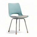 Chaise en plastique léger avec assise en simili cuir gris dimensions 45 x 45 x 85cm couleur bleu vert